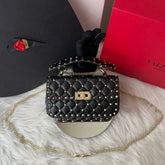 Bolsa Valentino rock stud