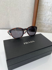 Óculos Prada