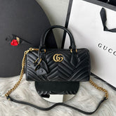Bolsa Gucci Marmont alça de mão
