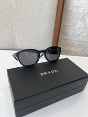 Óculos Prada