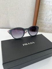 Óculos Prada